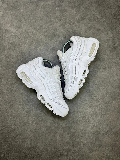 Freshly cleaned white Nike Air Max 95 sneakers